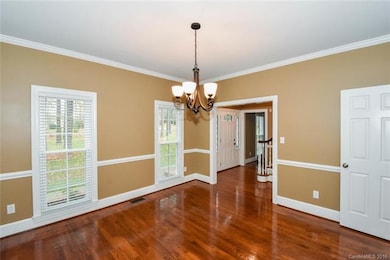 Good size dining room with plenty of wall space fo