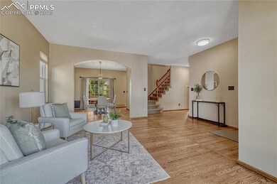 Hardwood flooring continues through most of the main level