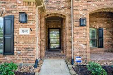 A convenient front covered porch with sitting area