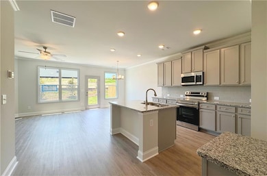 Kitchen with ornamental molding, light wood-style 