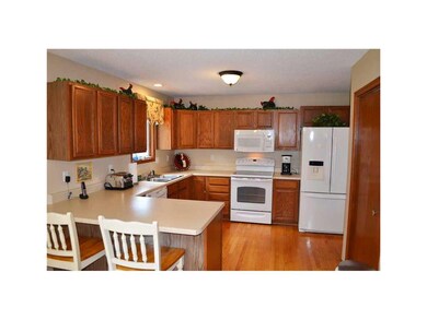 Kitchen. Oak cabinets, hardwood floors, breakfast 