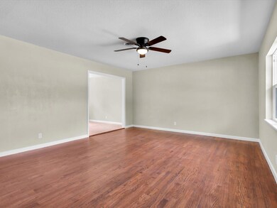 Living room opeing to kitchen nook