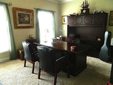 Could be used as formal living room, but glass doo