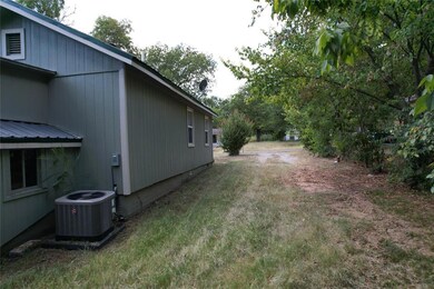 View of yard featuring central air condition unit