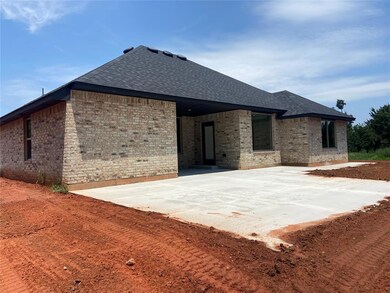 View of front facade with a patio area