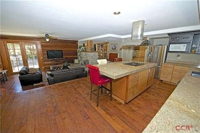 FROM THE KITCHEN INTO THE LIVING ROOM..
