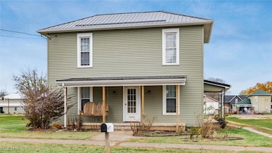 126 W 3rd St, Frazeysburg, OH 43822 - photo 2
