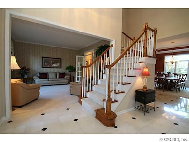 Foyer open foyer to formal living room and den
