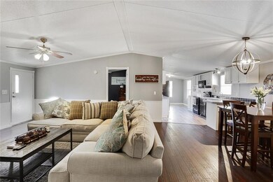 Laminate wood floors, updated paint colors. Living