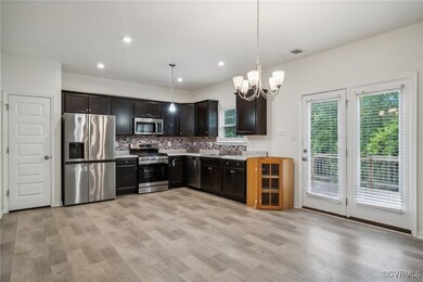 Kitchen with appliances with stainless steel finis