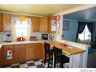 Kitchen. The kitchen features plenty of cupboards,