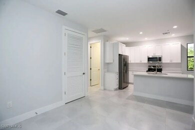 Kitchen with appliances with stainless steel finis