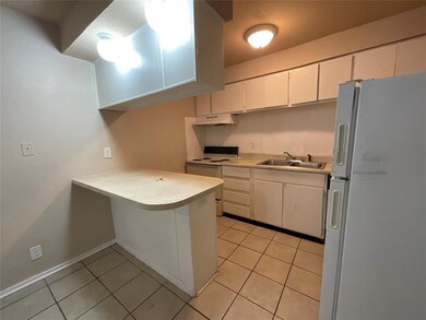 Pictured is interior of unit #2 in Elm St building