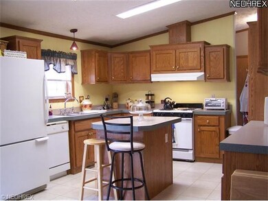 Nice, open kitchen with oak cabinetry