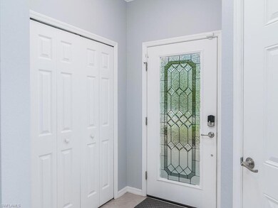 Foyer entrance featuring tile floors