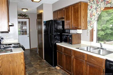 Kitchen with beautiful view of back yard