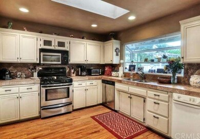 Updated Kitchen with Travertine tile counters, new
