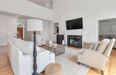 Living room featuring light hardwood / wood-style 