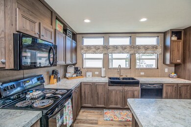 Plenty of counter space and cabinets on this count