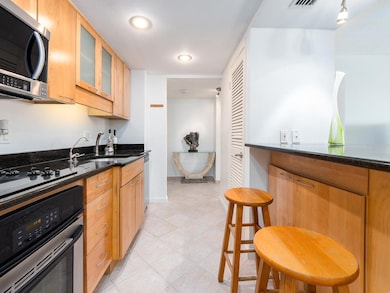 Walls removed to Open Kitchen, lots of counter space and stainless steel appliances