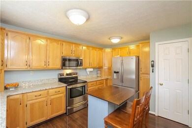 Kitchen had a make over with granite and stainless. Lots of counters, cabinets and a separate pantry.