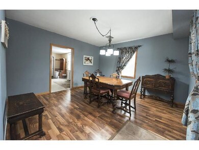 You'll love the formal dining room with new floors