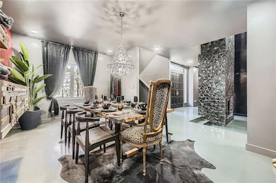 Dining room featuring an inviting chandelier and r