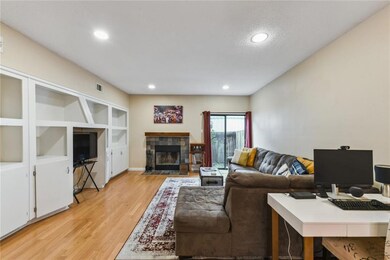 Living Room with Beautiful Hard Wood floors out to