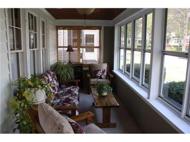 Porch - Enclosed. Enclosed porch loaded with windo