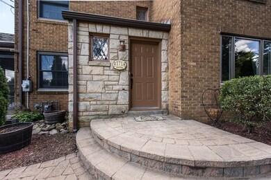 The stone entrance welcomes you home.  The stone p