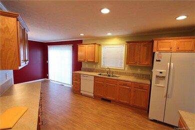 Kitchen is open to dining room.