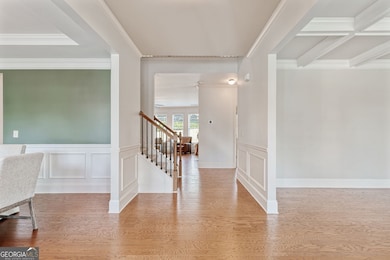 Welcome your guest into this bright beautiful foyer.  Hardwoods throughout the main living area.