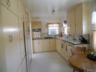 Front house eat in kitchen with lots of natural light.