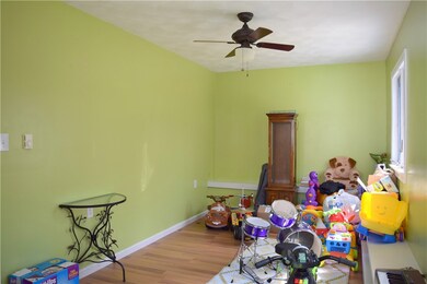 Sunroom off garage leading to back yard