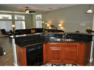 Property Photo. Kitchen to Family Room