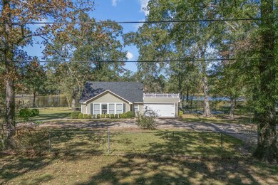 Tucked among the trees on a peaceful 12-acre lake.