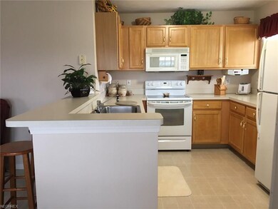 This wonderful kitchen offers a functional U shape