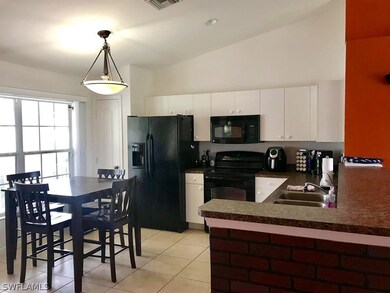 Kitchen and eat in dining