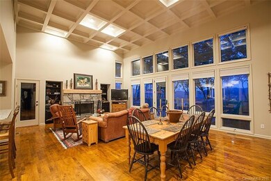 Soaring architecturally coffered ceilings. A wall 