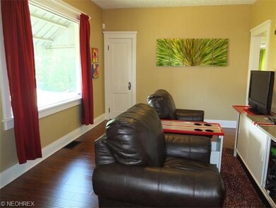 Formal dining room with large picture window.