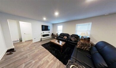 Living room with light wood-type flooring