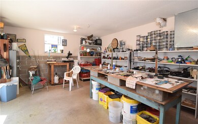 large shop space in basement w dbl doors