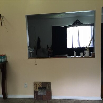 A view from the kitchen into the living room>