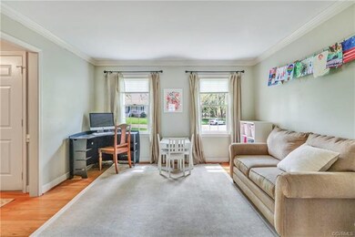 Living room that opens to the family room. Currently used as a playroom