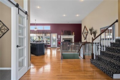 Hardwood floors, custom barn doors to the office a
