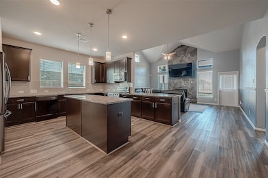 Experience the joy of creating culinary delights in this thoughtfully designed kitchen, where the combination of ample storage space, stainless steel appliances, and gas cooking amenities elevates your cooking experience to new heights.