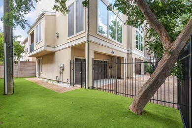 Fully fenced and turfed, the side yard offers a lo