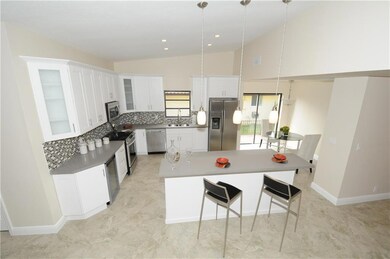 Lots of cabinet storage and large pantry (Located