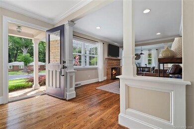 Bright foyer overlooks family room