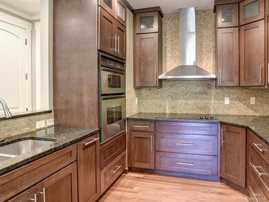 Granite counter tops, and custom cabinets